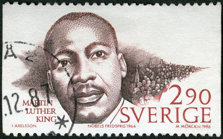 SWEDEN - CIRCA 1986: A stamp printed in Sweden shows Martin Luther King Jr. (1929-1968), Nobel Peace Prize Laureates, circa 1986のeditorial素材