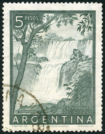 ARGENTINA - CIRCA 1954: A stamp printed in Argentina shows Iguacu Falls, Cataratas Deliguazu, circa 1954のeditorial素材