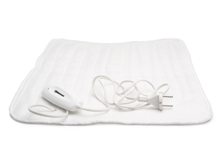 Electric heating pad on white backgroundの写真素材