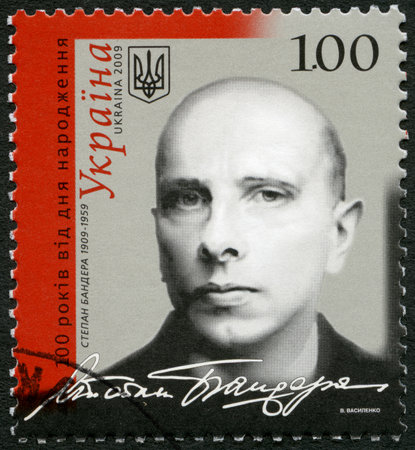 UKRAINE - CIRCA 2009: A stamp printed in Ukraine shows Stepan Andriyovych Bandera (1909-1959), circa 2009のeditorial素材