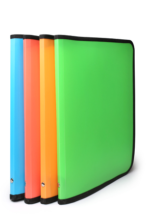Bright colored plastic folders on white backgroundの写真素材