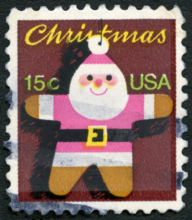UNITED STATES OF AMERICA - CIRCA 1980: A stamp printed in USA shows Santa Claus Christmas Tree Ornament, circa 1980のeditorial素材