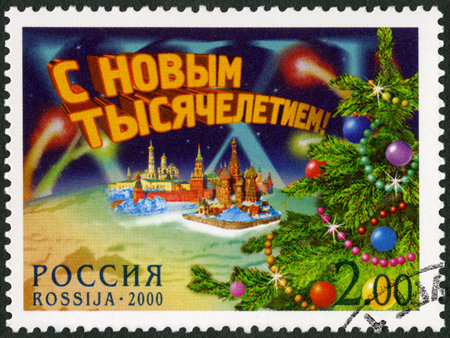 RUSSIA - CIRCA 2000: A stamp printed in Russia shows the Moscow Kremlin and Staint Basil's Cathedral, devoted New Year, Happy New Millennium, circa 2000のeditorial素材