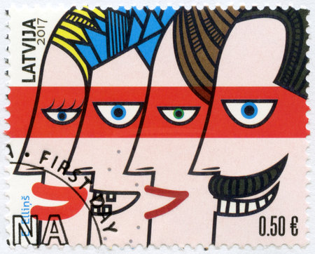 LATVIA - CIRCA 2017: A stamp printed in Latvia shows family, International Day of Families, circa 2017のeditorial素材