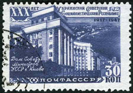 USSR - CIRCA 1947: A stamp printed in USSR shows Government Building, Kiev, series Ukrainian SSR, 30th anniversary, circa 1947のeditorial素材