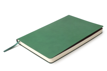 Green datebook on  white backgroundの写真素材