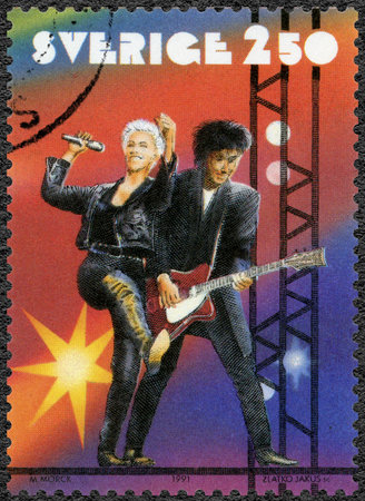 SWEDEN - CIRCA 1991: A stamp printed in Sweden shows Roxette, Swedish pop rock duo, Rock Musicians, circa 1991のeditorial素材