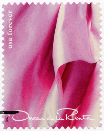 UNITED STATES OF AMERICA - CIRCA 2017: A stamp printed in USA shows details from exquisite gown of  Oscar de la Renta (1932-2014), fashion designer, circa 2017のeditorial素材