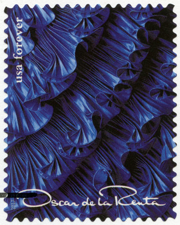 UNITED STATES OF AMERICA - CIRCA 2017: A stamp printed in USA shows details from exquisite gown of  Oscar de la Renta (1932-2014), fashion designer, circa 2017のeditorial素材