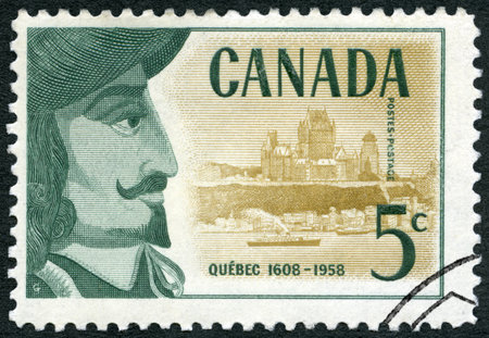 CANADA - CIRCA 1958: A stamp printed in Canada shows Samuel de Champlain (1574-1635) and view of Quebec, 350th Anniversary of Founding of Quebec, circa 1958のeditorial素材