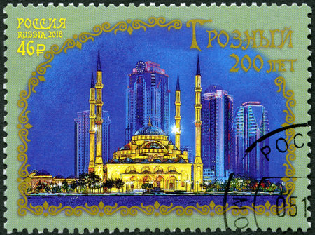 RUSSIA - CIRCA 2018: A stamp printed in Russia shows The mosque Heart of Chechnya, 200th Anniversary of Grozny, modern architecture, circa 2018のeditorial素材
