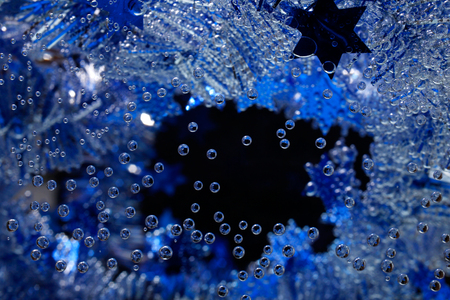 Blue christmas card with bubbles, a horizontal pictureの写真素材
