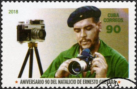 CUBA - CIRCA 2018: A stamp printed in Cuba shows commander Ernesto Guevara de la Serna Che Guevara (1928-1967) and photo camera, circa 2018のeditorial素材