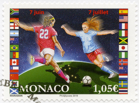 MONACO - MAY 29, 2019: A stamp printed in Monaco shows footballers, 2019 Football Women's World Cup, 2019のeditorial素材