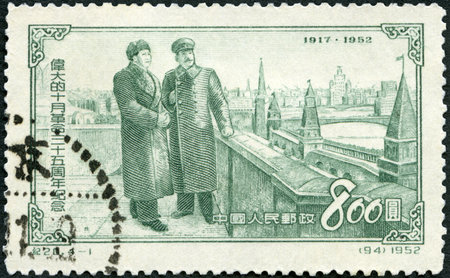 Moscow, Russia - March 17, 2020: A stamp printed in China shows Joseph Vissarionovich Stalin Jughashvili (1878-1953) and Mao Zedong Chairman (1893 - 1976), on Kremlin Terrace, circa 1953のeditorial素材