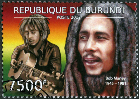 BURUNDI - CIRCA 2012: A stamp printed by Burundi shows portrait of Robert Nesta Bob Marley (1945-1981), Reggae Musician, circa 2012のeditorial素材