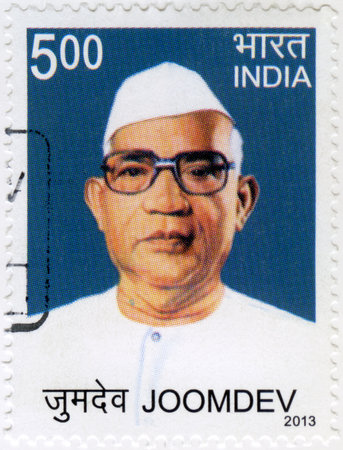 INDIA - CIRCA 2013: A stamp printed in India shows Baba Joomdev, Spiritual Leader, circa 2013のeditorial素材