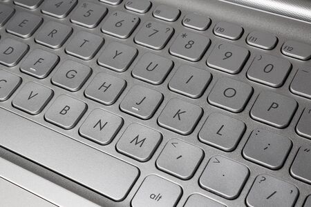Closeup keyboard of modern laptop, for backgrounds or textures
