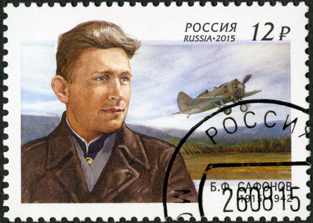 RUSSIA - CIRCA 2015: A stamp printed in Russia dedicated the 100th birth anniversary Boris Safonov (1915-1942), fighter polit, twice Hero of the soviet union, circa 2015のeditorial素材