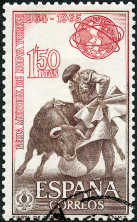 SPAIN - CIRCA 1964: A stamp printed in Spain shows Fighting with cape, Bullfight and Unisphere,...