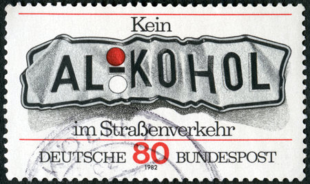 GERMANY - CIRCA 1982: A stamp printed in Germany shows word alcohol, Do not Drink and Drive, circa 1982のeditorial素材