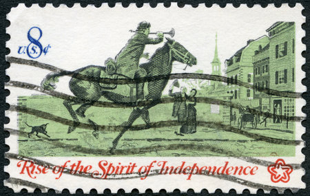 UNITED STATES OF AMERICA - CIRCA 1973: A stamp printed in USA shows Postrider, Rise of the Spirit of Independence, circa 1973のeditorial素材