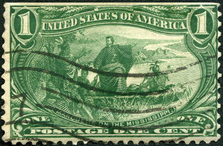 UNITED STATES OF AMERICA - CIRCA 1898: A stamp printed in USA shows Pere Jacques James Marquette (1637-1675) and the Indians at the Mississippi River, Trans Mississippi Exposition Issue, circa 1898のeditorial素材
