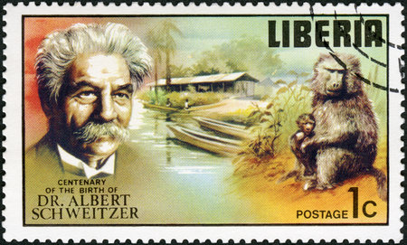 LIBERIA - CIRCA 1975: A stamp printed in Liberia shows hospital and baboon mother, series Dr. Albert Schweitzer (1875-1965), medical missionary, 100th anniversary of the birth, circa 1975のeditorial素材