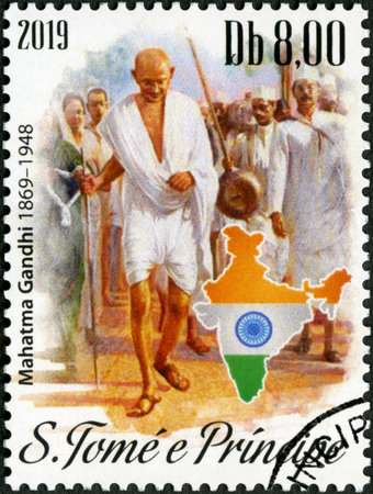 ST. THOMAS AND PRINCE ISLANDS - CIRCA 2019: A stamp printed in St.Thomas and Prince Islands shows Mahatma Mohandas Karamchand Gandhi (1869-1948), India map, circa 2019のeditorial素材