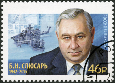 RUSSIA - CIRCA 2021: A stamp printed in Russia shows Boris Nikolaevich Slyusar (1942-2015) General Director of Rostvertol, circa 2021のeditorial素材
