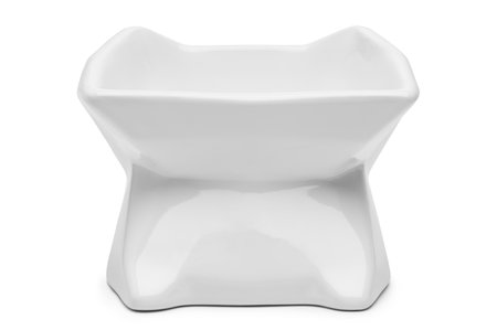 Empty ceramic bowl for pet food on white backgroundの写真素材