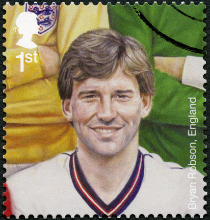 UNITED KINGDOM - CIRCA 2013: A stamp printed in United Kingdom shows Bryan Robson (born 1957), football player, Football Heroes, circa 2013のeditorial素材