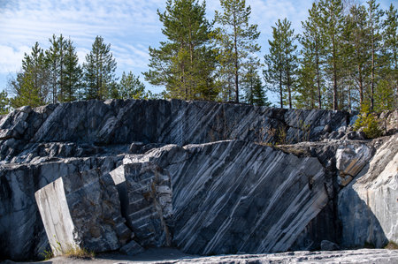 Marble walls of a marble quarry in Ruskeala Mountain Park, Karelia, Russia