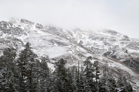Winter mountain landscape with rocks and snow, Prielbrusye, Kabardino-Balkaria, Russia