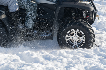Quad bike in snowの写真素材