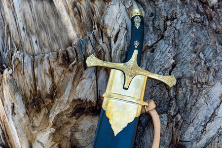 sword vintage metal on wood backgroundの写真素材