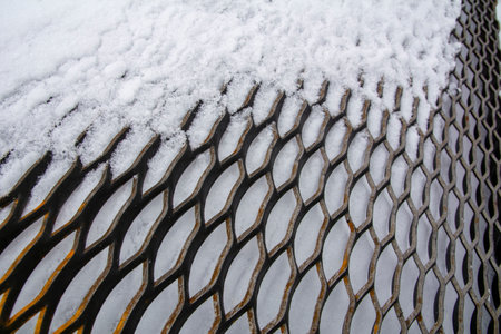 expanded metal sheet rusty on white backgroundの写真素材