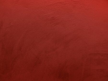 Red grunge cement wall, textured background