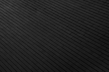 perspective part of black painted brick wall