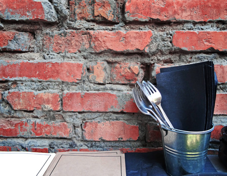 Rustic vintage set of fork. Brick background.の写真素材