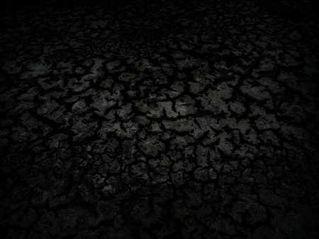Dark cracked clay ground, drought land background                               の写真素材