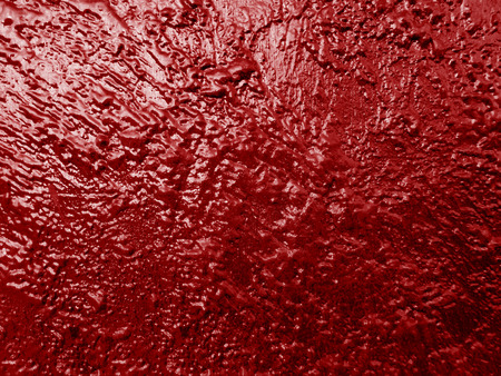 scratched red paint on grunge metal                               