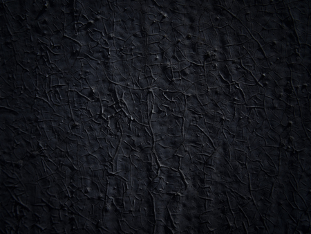 Black paint texture with crack, closeup, background                                   の写真素材