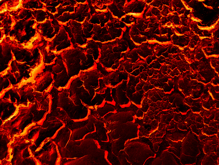 Lava crack ground mud textured backgroundの写真素材