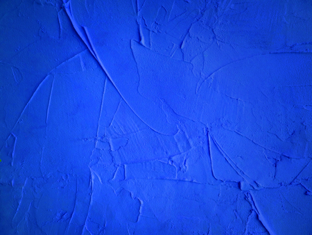 Blue textured wall close up. Abstract light background.の写真素材