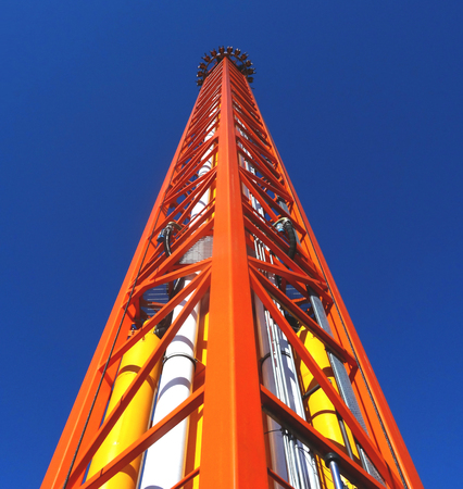 Free fall tower. Amusement ride. Theme park.