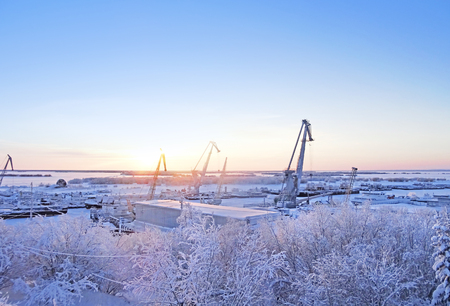 Industrial port with in winter, vessel loading in port of Russiaの写真素材