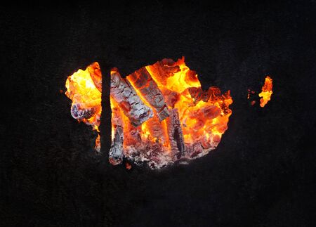 Hot coals in fireplace, fire background, close-up, macro.の写真素材