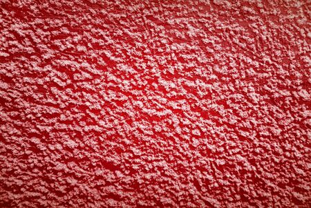 Snow on wooden background, space for text in red tonesの写真素材