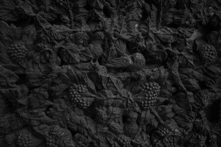 Dark Wood carving pattern of the window of old house                               の写真素材